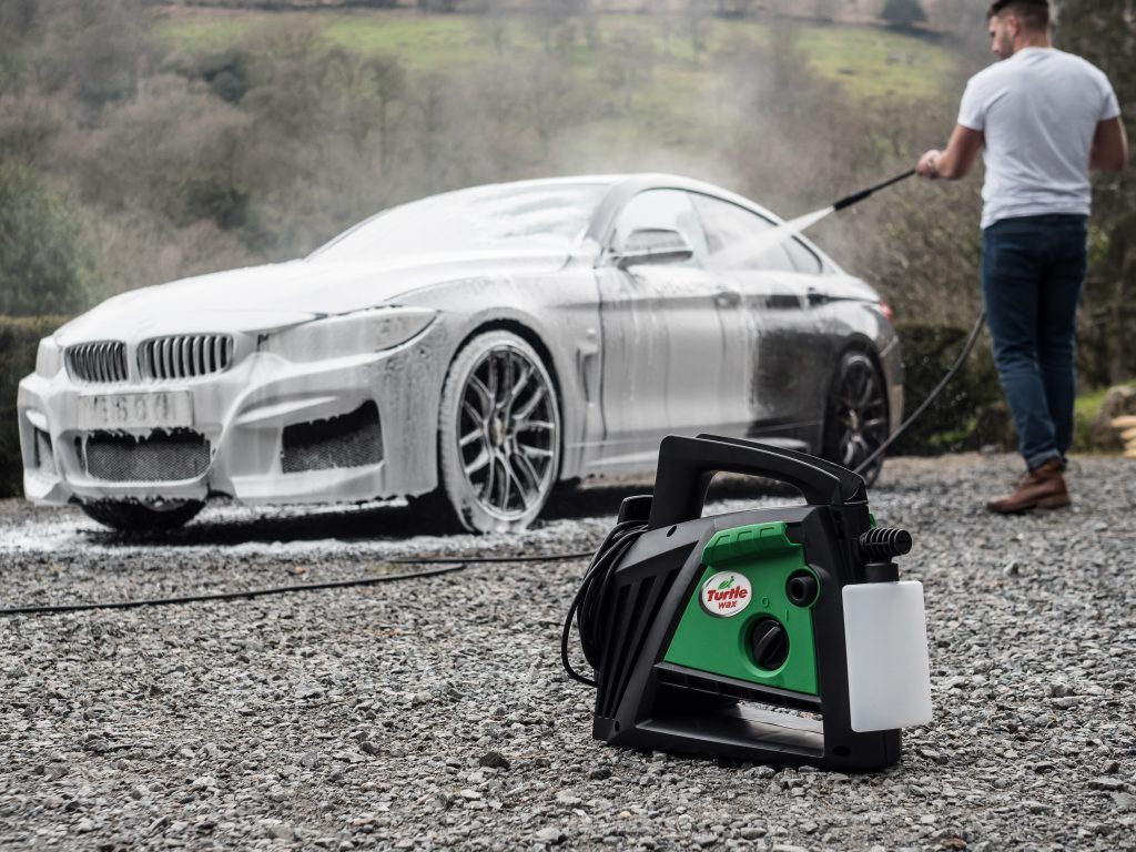 Can I use a pressure washer to wash the car