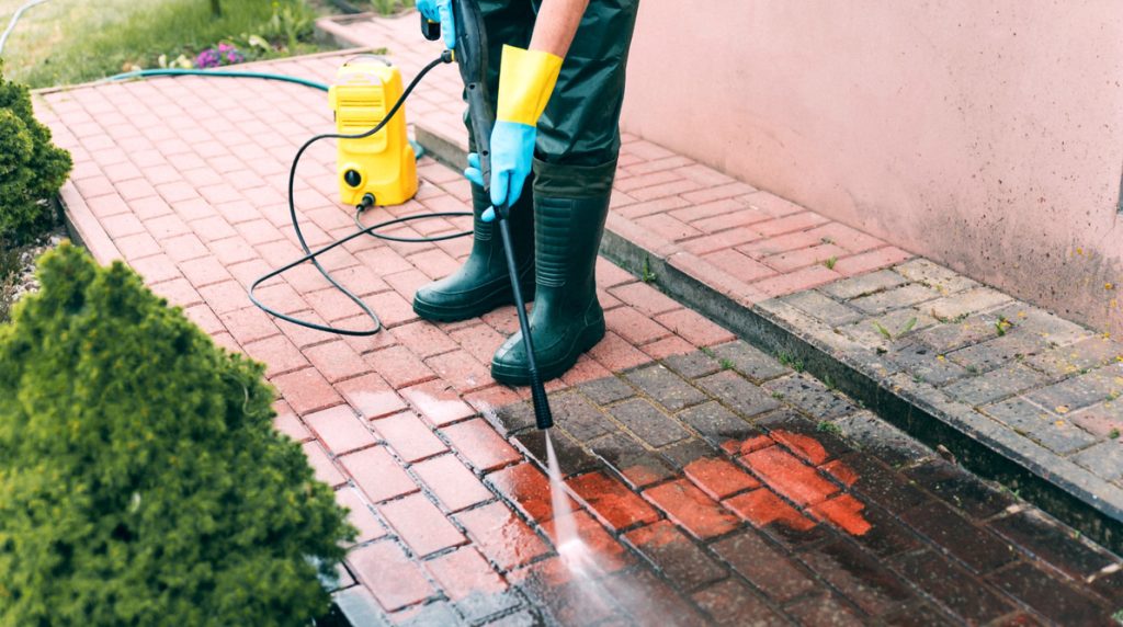 Use a pressure washer to remove stubborn dirt from the paving stones. Test the stones in an inconspicuous place to see if they can withstand the high pressure.