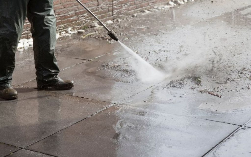 Cleaning with a pressure washer